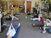 woman perfoming a pilates exercise