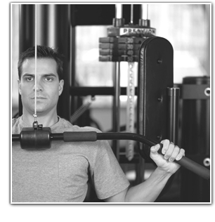 Image: Man performing Lateral Pulldowns at Body Solutions in Voorhees New Jersey